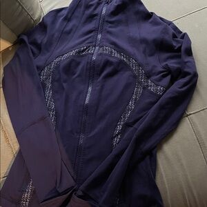 Lightly worn, purple lululemon define jacket with pattern trimming - sz 4/6